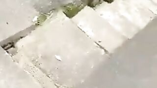 Показал свой черный член, не снимая шорт